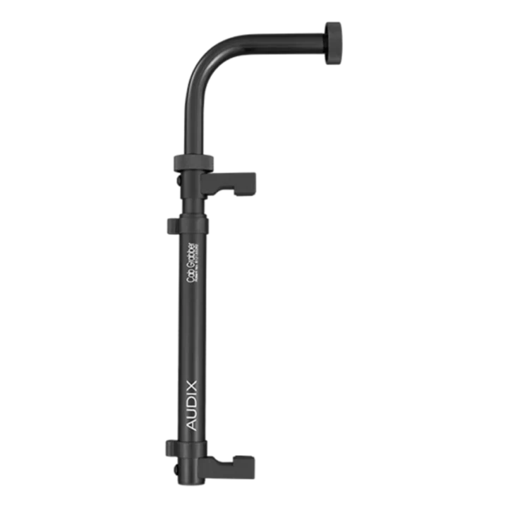 AUD compact microphone clamp mounted on guitar amplifier cabinet showing adjustable grip mechanism