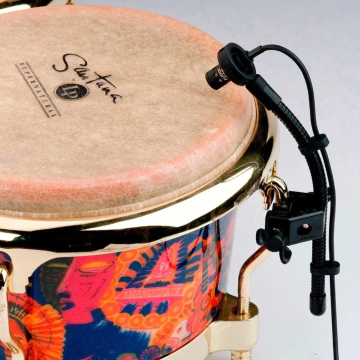 AUD miniature condenser lug-mounted microphone showing capsule and mounting hardware detail