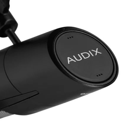 AUD PDX520 dynamic vocal microphone showing grille and capsule detail with professional construction
