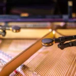 AUD SCX25APS piano miking system microphones positioned on grand piano for professional recording