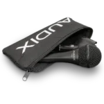 AUD professional dynamic vocal microphone mounted on stand in live performance application