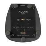 AUD USB condenser microphone mounted on boom arm in home recording studio setup with pop filter