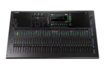 Allen & Heath Qu-7 digital mixer showing faders, encoders, and touchscreen interface from side angle