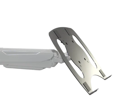 K&M laptop rest mounted on monitor stand, black finish, side profile showing depth and mounting bracket