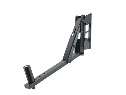 K&M black speaker wall mount installed on studio wall with professional audio speaker mounted