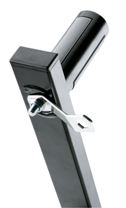 K&M speaker wall mount installed on wall showing adjustable 22-degree tilt angle application