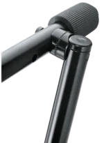 K&M Stacker black microphone stand in professional studio recording environment with microphone mounted