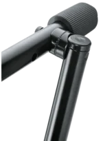 K&M Stacker black microphone stand in professional studio recording environment with microphone mounted