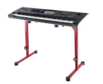 K&M red table-style keyboard stand supporting electronic keyboard in home studio environment