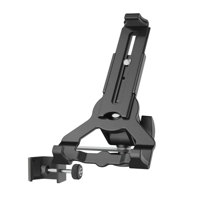 K&M universal clamp-on tablet holder in black biobased material, front view with adjustment mechanism