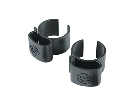 K&M black cable clamps mounted on speaker and lighting stand pole, front view