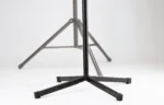 K&M black speaker stand rear panel showing cable management and mounting hardware details