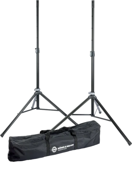 K&M speaker stand package with carry bag, black finish, front view showing full assembly