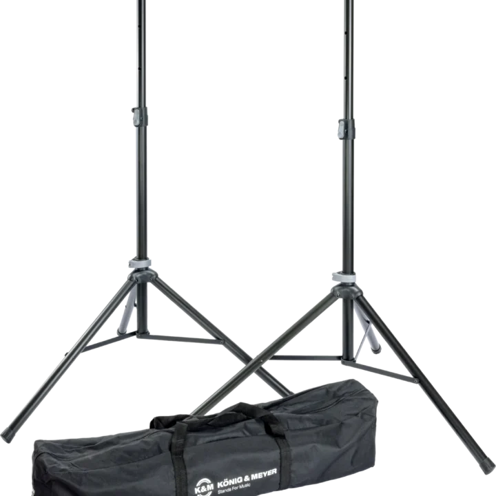 K&M speaker stand package with carry bag, black finish, front view showing full assembly