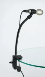 K&M table clamp black finish shown from side angle with mounting hardware visible