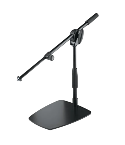 K&M tabletop floor microphone stand with short boom arm in black finish, lifestyle setup