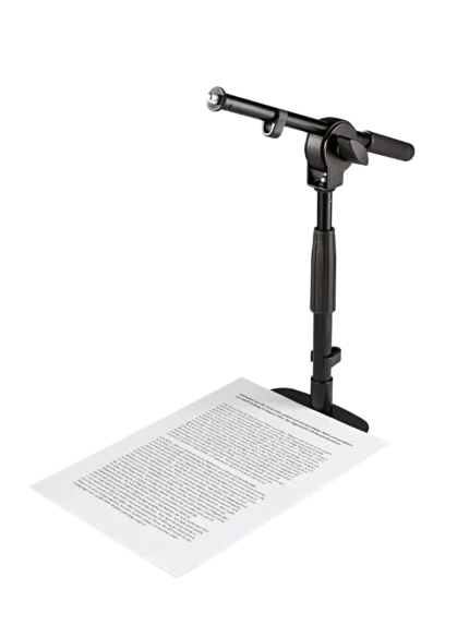 K&M tabletop microphone stand with short boom arm and weighted base, black finish