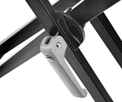 K&M X aluminum keyboard stand black finish shown from side angle with adjustable height mechanism