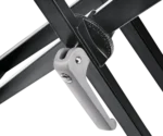 K&M X aluminum keyboard stand black finish shown from side angle with adjustable height mechanism