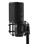 Shure KSM40C large diaphragm condenser microphone mounted on boom arm in professional studio recording setup