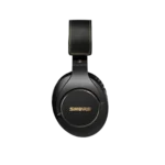 Shure SRH840A professional studio headphones worn during audio recording session with mixing console