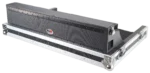 ProX ATA flight case for Behringer WING digital mixer with doghouse compartment and caster wheels in studio setting