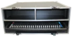 ProX ATA flight case for Allen & Heath SQ6 digital audio mixer with doghouse compartment and caster wheels in studio environment