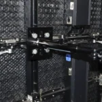 ProX black LED panel wall mounting plate with 2-inch pole truss clamp extension, side profile view