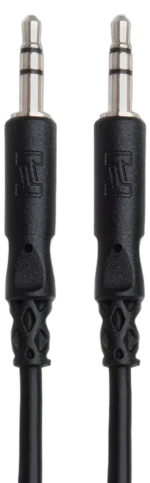 Hosa CMM-105C 3.5mm TRS stereo interconnect cable connected between audio devices in studio setup