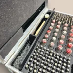 ProX ATA flight case interior showing organized coupler storage compartments and hardware management