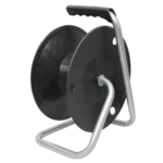 ProX 12-inch cable storage drum in professional studio setup with XLR cables wound on maintenance-free bearing