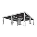 ProX StageOne 8x8 modular stage platform with four decks and adjustable legs installed in performance venue