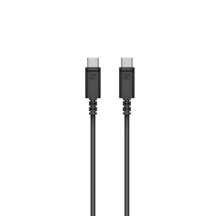 Sennheiser Profile USB-C condenser microphone positioned on desk with professional studio setup and accessories