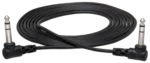 Hosa CSS-125 25-foot balanced interconnect cable with 1/4 inch TRS connectors in professional studio setting