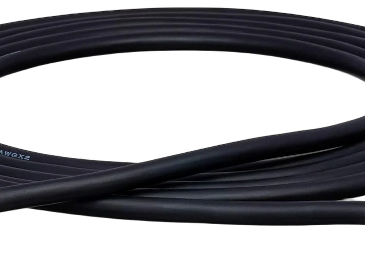 Hosa SKJ-620 speaker cable with 1/4 inch TS connectors, 20 foot length, coiled display
