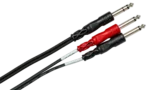 Hosa STP-203 insert cable showing 1/4 inch TRS and dual TS connectors close-up