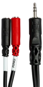 Hosa YMM-261 stereo breakout cable connected between audio equipment demonstrating practical studio application